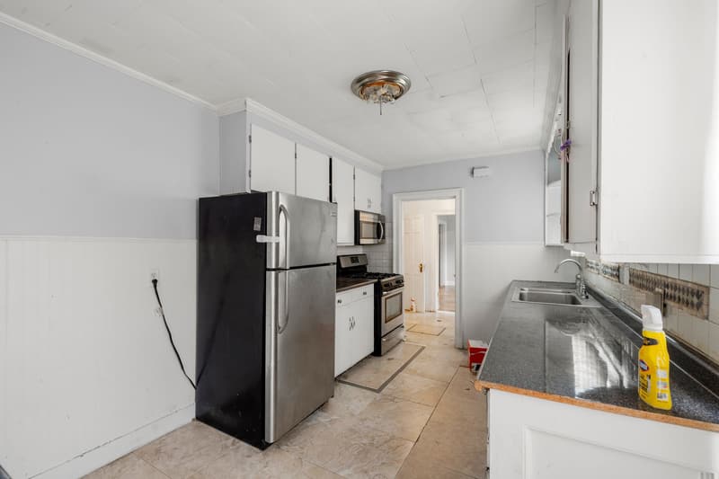 275 Bank Street, kitchen with stainless refrigerator